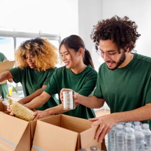 A few food drive workers packaging boxes.