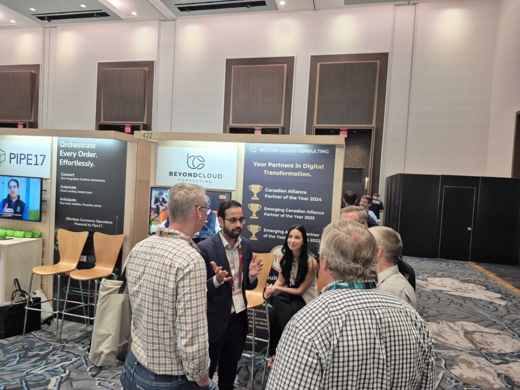 Our SuiteWorld 2025 booth with our sales team.