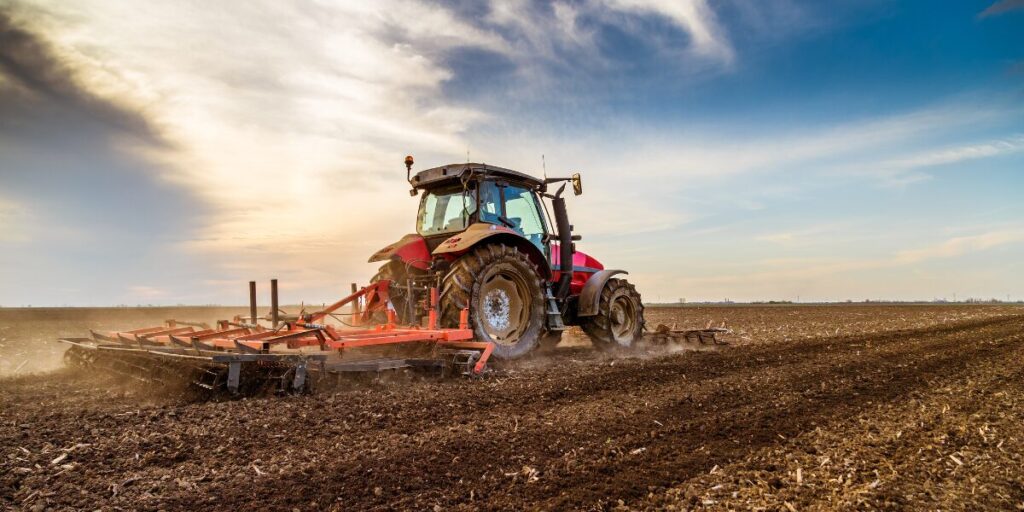 A tractor plowing a field.