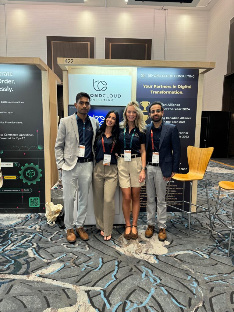 Our SuiteWorld 2025 booth with our sales team.