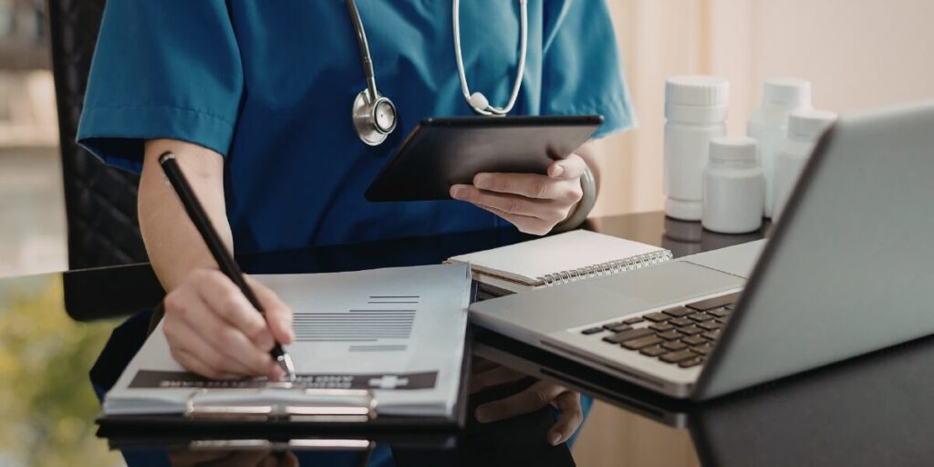 A doctor checking off a list of symptoms.