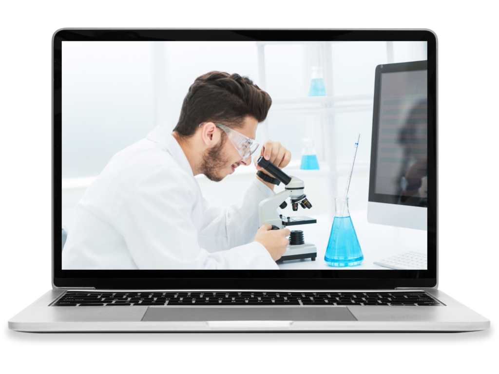 A laptop showing a scientist looking through a microscope.
